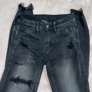 Dark grey American Eagle distressed jegging size 2